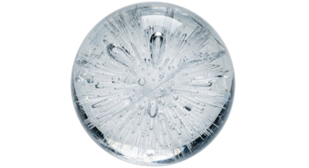 Isolated clear sphere glass ornament with internal burst pattern for decoration in macro view