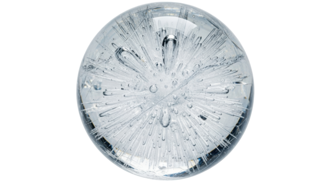 Isolated clear sphere glass ornament with internal burst pattern for decoration in macro view