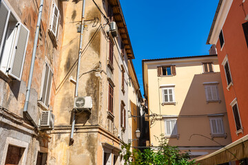 Colorful house facades in the old quarter of the holiday town of Piran, Slovenia.