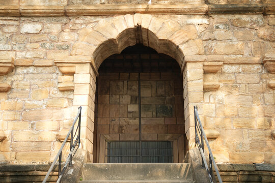 old wooden door in a stone wall