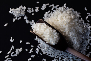 Close-up of White Rice with Wooden Spoon