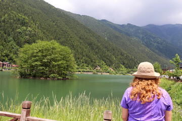 A traveler watching Uzungol. Trabzon, Turkey
