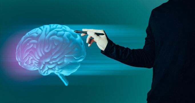 hand of businessman interactive touching a holographic artificial intelligence brain system network and technology