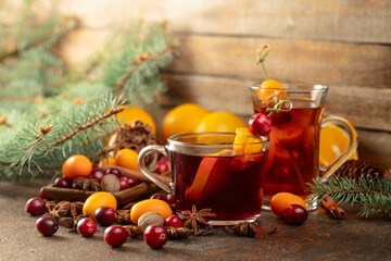 Winter drinks with ingredients on a old kitchen table.