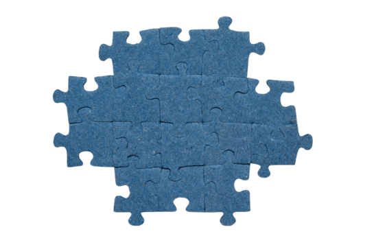 Jigsaw puzzles placed together isolated. A cutout piece of blue puzzles picture.