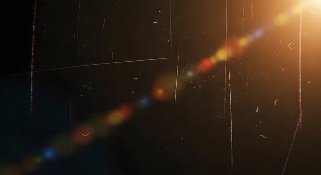 Vintage film texture overlay with light leaks and dust for authentic retro feel, perfect for adding character and nostalgia to your designs