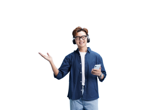 Modern Melodies: A young man is happily immersed in the world of music through his headphones, holding a smartphone, he extends a welcoming gesture.