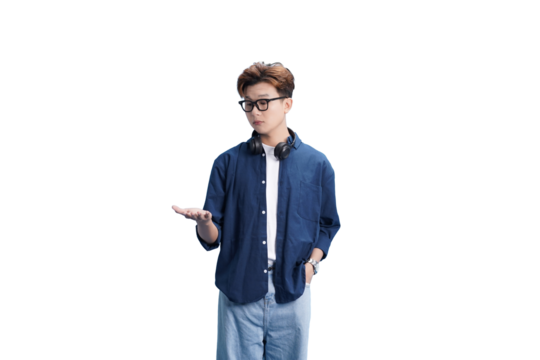 Modern Man Gesturing: A stylish young man with glasses and headphones around his neck, makes a gesture, conveying an inviting sense of communication.