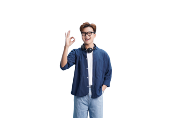 Content Youthful and Approved: A young man with eyeglasses, sporting a blue shirt, offers a confident okay gesture. The image captures a sense of positive affirmation.