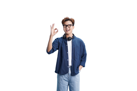 Content Youthful and Approved: A young man with eyeglasses, sporting a blue shirt, offers a confident okay gesture. The image captures a sense of positive affirmation.