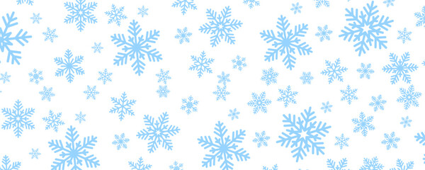 pattern of blue snowflakes scattered across a white background