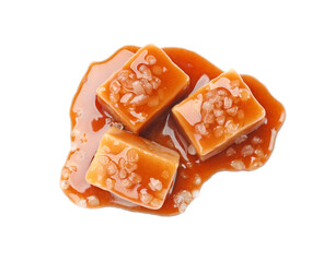 Tasty candies with salt and caramel sauce isolated on white, top view