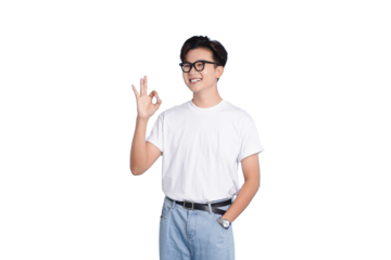 Okay Gesture of a Youth: A youthful individual, with a gentle smile and wearing eyeglasses, gives a positive okay gesture, showcasing a vibe of agreement and happiness.
