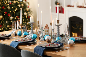 Festive table setting with Christmas decor at home