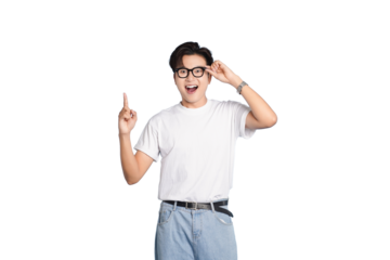 Eureka! The man's sudden idea! A young man is illuminated with delight as he experiences a moment of clarity, his eyes widening with epiphany. 