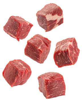 Fresh raw beef cubes meat chunks cuts isolated on black background for cooking delicious meals and recipes on transparent background