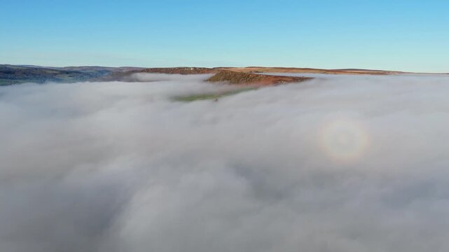 Scenic Cloud Inversion at the Peak District National park in the UK.  Cinematic Drone Landscape Exploration around Froggatt Edge, Curbar Edge and Baslow Edge, which are the most popular hiking trails.