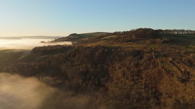Scenic Cloud Inversion at the Peak District National park in the UK.  Cinematic Drone Landscape Exploration around Froggatt Edge, Curbar Edge and Baslow Edge, which are the most popular hiking trails.