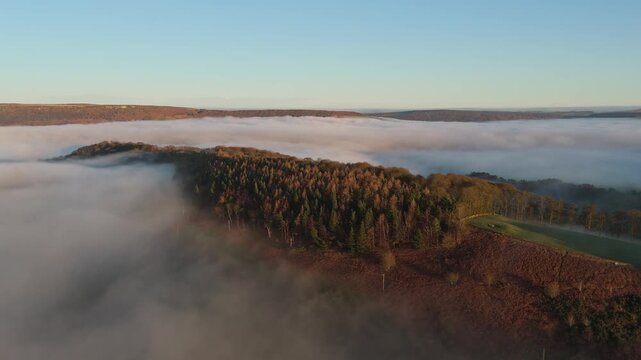 Scenic Cloud Inversion at the Peak District National park in the UK.  Cinematic Drone Landscape Exploration around Froggatt Edge, Curbar Edge and Baslow Edge, which are the most popular hiking trails.