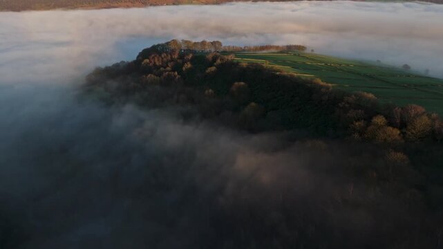 Scenic Cloud Inversion at the Peak District National park in the UK.  Cinematic Drone Landscape Exploration around Froggatt Edge, Curbar Edge and Baslow Edge, which are the most popular hiking trails.
