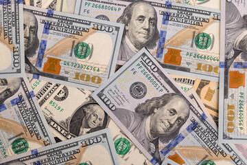 Full Frame Scattered US One Hundred Dollar Banknotes Background
