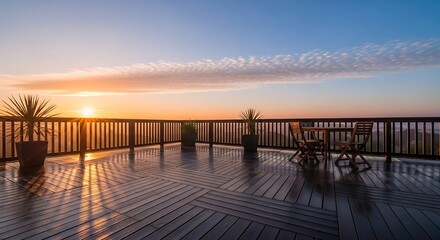 Obraz premium Scenic sunrise view from wooden deck featuring outdoor furniture and potted plants, beautiful morning light.
