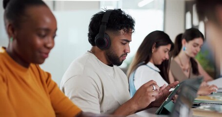 Man, student and thinking with tablet on campus for education, study and listening to music. People, headphones and streaming podcast with digital, online learning and course research for assignment - Powered by Adobe