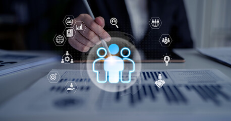 Glowing human figures surrounded by business icons representing HR data analysis, employee management, and recruitment analytics Parse