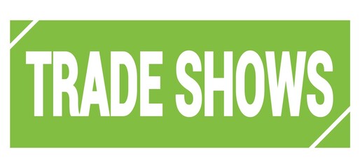 TRADE SHOWS text written on green stamp sign.