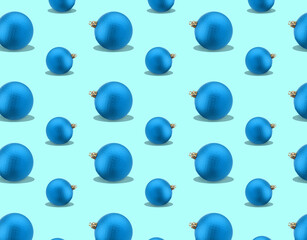Christmas balls on light blue background. Festive repetitive pattern