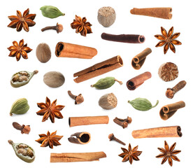 Set of different Christmas spices on white background. Anise, nutmeg, cardamom, clove and cinnamon