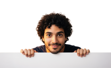 Cheerful young man peeking over blank panel used in friendly announcements and product updates, helpful for online store headers or email marketing about new services plus special offers