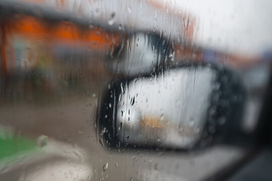 Rainy Car Window Abstract City Lights - Powered by Adobe