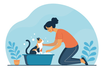 Woman gently bathes fluffy cat in a tiny porcelain tub, soft water splash, tender care, domestic bliss, pet grooming, hygiene.