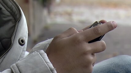 Kid Focused on Portable Game Device, Close Up - 4K