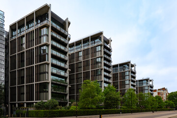London, United Kingdom - 15 May 2025: Luxury modern residential architecture: exclusive high-rise apartments in  Kensington Road © Mariano