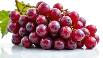 Fototapeta premium A bunch of fresh red grapes, which appear plump and ripe, resting on a surface that is blurred, drawing focus to the grapes themselves.