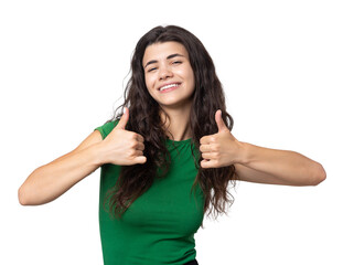 Fototapeta premium Close-up portrait of attractive surprised girl, showing thumbs up gesture. Success luck concept.