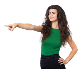 Happy young caucasian female in a shirt pointing fingers away