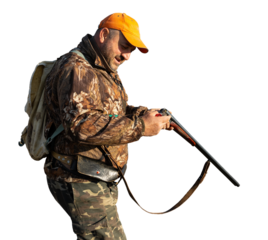 Midsection of man unloading shotgun while standing on field