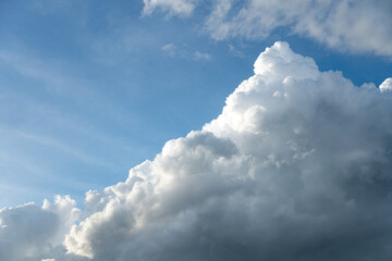 Bulk of fluffy cloudy in daylight blue sky before raining coming. Cloudscape nature scene.
