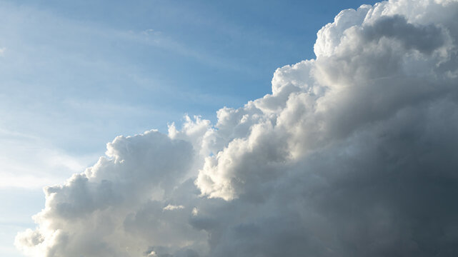 Bulk of fluffy cloudy in daylight blue sky before raining coming. Cloudscape nature scene.