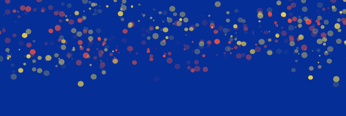 Colorful blurred Christmas bokeh lights on blue background festive overlay design.