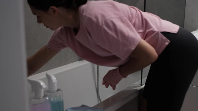 Bathroom area sanitation with spray and cloth