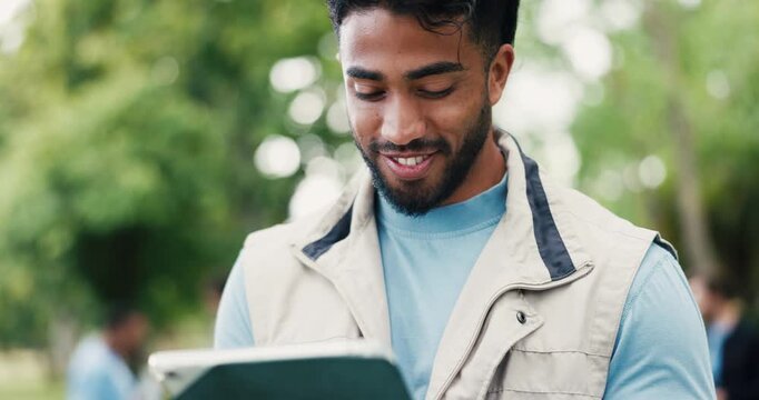 Tablet, man and charity worker outdoor with planning for social responsibility, ngo or volunteer event. Thinking, nature and male person with technology for checklist for community outreach in park.