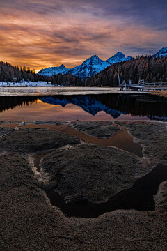 Beautiful sunset sky over the Staz Lake in the famouse St. Moritz of Swiss Alps moountain, Grisons, Swtzerland