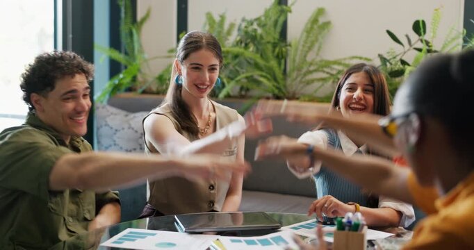 Happy, creative people and meeting with hands together for success, mission or unity in office. Group, employees or applause with pile or stack for team goals, solidarity or synergy in workplace