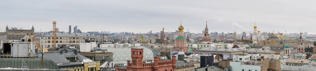Panoramic View of Moscows Cityscape Showcasing Historic Architecture and Modern Skyline Under a...