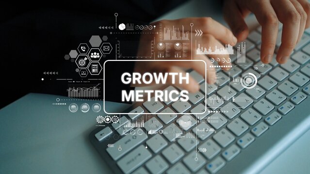Hands Typing on Keyboard with Growth Metrics Data Visualization Concept for Business Analysis and Performance Tracking. Asymptotic smart data analytic.