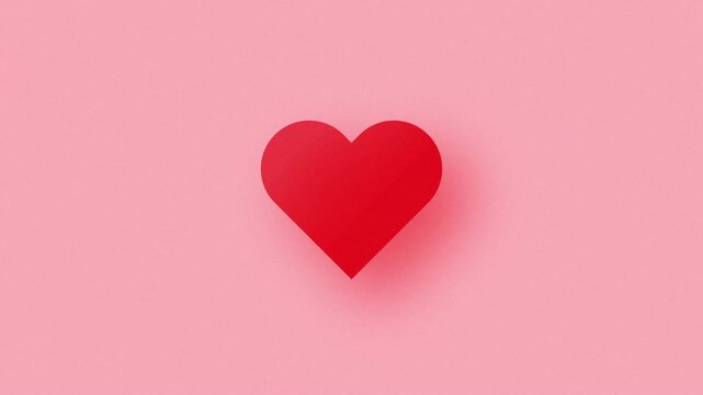 Animated red beating heart on soft pink background symbolizing love, romance, affection and celebration for Valentine's Day, wedding or romantic projects